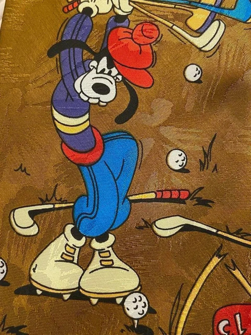 Mickey Unlimited Disney Goofy Golfing Tie ⛳️